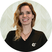 Lauren Duffy, DNP, APRN, FNP-C, Nurse Practitioner at Fem Excel, smiling in black medical uniform.