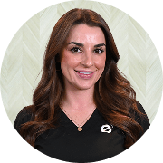 Andrea Mayfield, MSN, APRN, FNP-C, Nurse Practitioner at Fem Excel, smiling in black medical uniform.