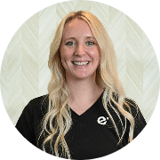 Meaghan Reilly, MSN, APRN, FNP-C, Nurse Practitioner at Fem Excel, smiling in black medical uniform.