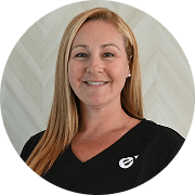 Kelley Wyant, MSN, RN, NP-C, Nurse Practitioner at Fem Excel, smiling in black medical uniform.