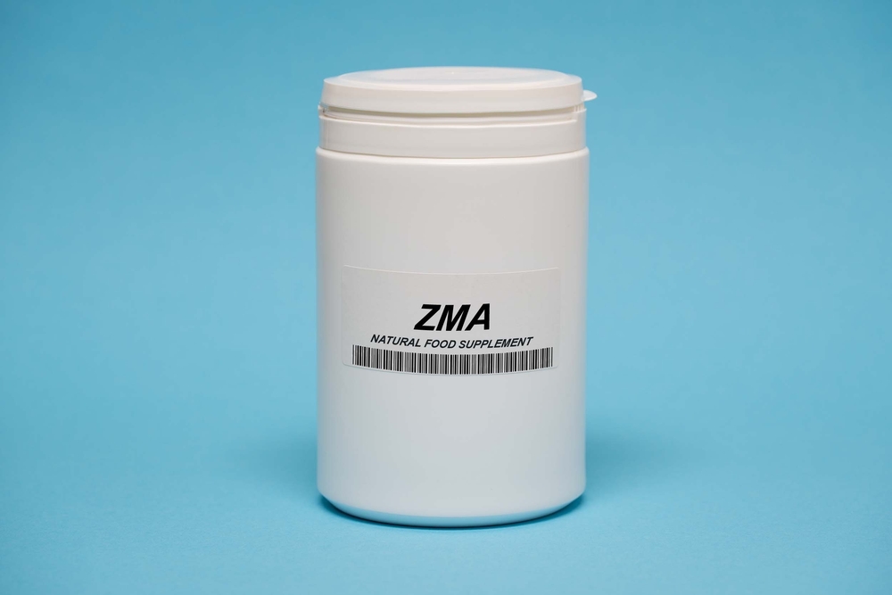 zma-and-testosterone-white-zma-supplement-on-blue-background