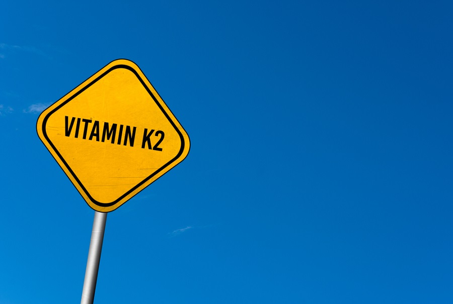 vitamin-k2-and-testosterone-vitamin-K2-written-on-yellow-sign-with-blue-sky-background vitamin-k2-and-testosterone-vitamin-K2-written-on-yellow-sign-with-blue-sky-background