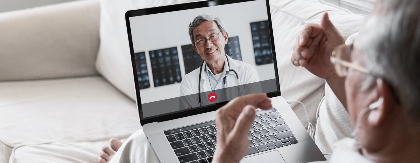 Man attending and online trt clinic from his sofa.